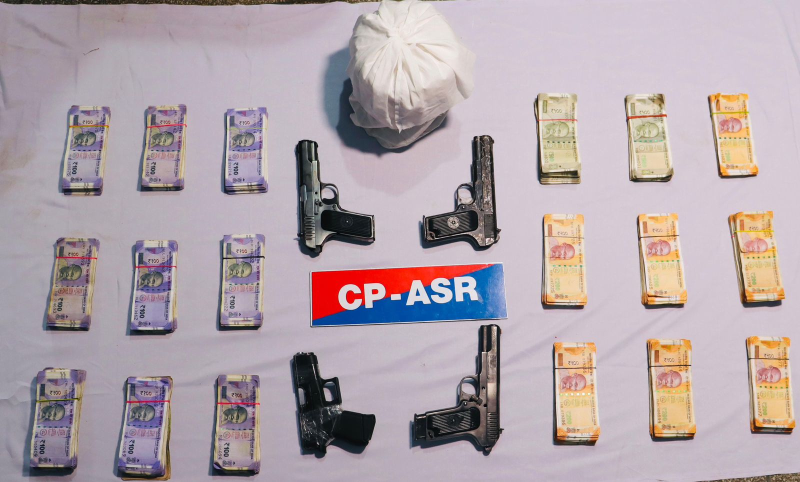 CROSS-BORDER SMUGGLING RACKET BUSTED; THREE HELD WITH 2.02KG HEROIN, ₹3.5L DRUG MONEY, 4 PISTOLS